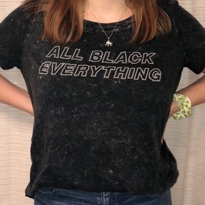 Black tshirts. One has multi colors